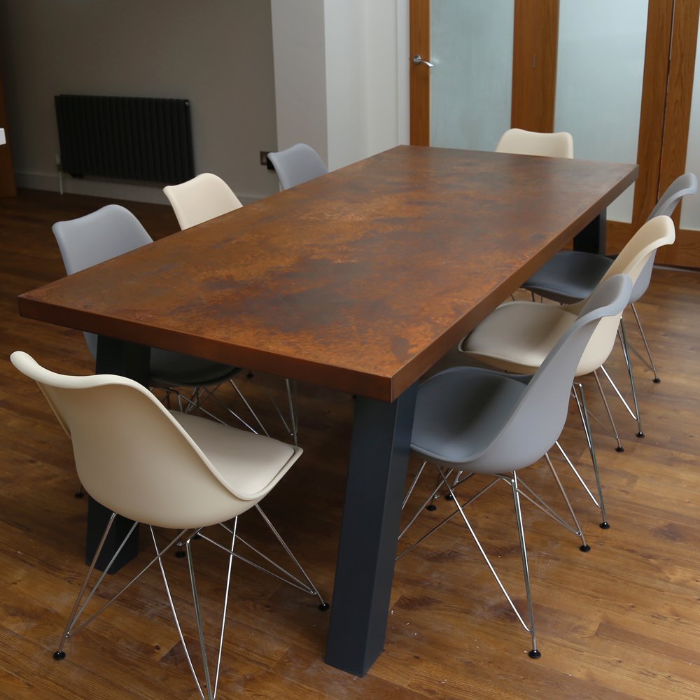 Sweep table with distressed copper top